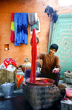 In the backstreets of Bikaner you will find many fabric dyers, they dye in steaming hot metal pots and every color is available. Bikaner, Rajahstan, India 2007.