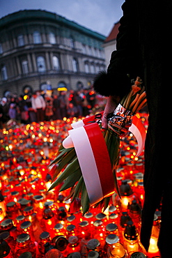 Mourners gather in Warsaw following the death in an airplane crash in Russia of the Polish president Lech Kaczynski, his wife and over ninety other high ranking government, military, civic and religious leaders.