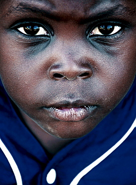 A portrait of a young child from Mozambique Island, Mozambique.