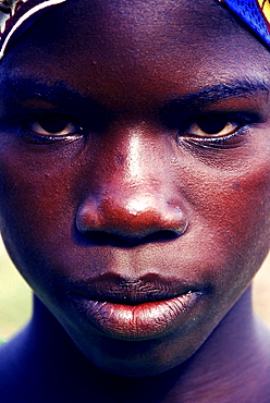 A portrait of a young Mozambican in the ghetto's of Mocimboa da Praia, Mozambique.