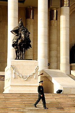 Man on steps of Parliament Building, Ulaanbaatar, Mongolia