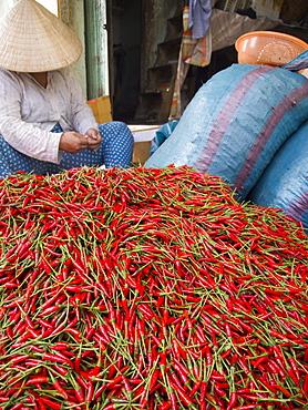 Chilis being sorted in a market in Ho Chi Minh City, Vietnam