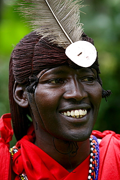 Masaai tribesman wearing a headdress.