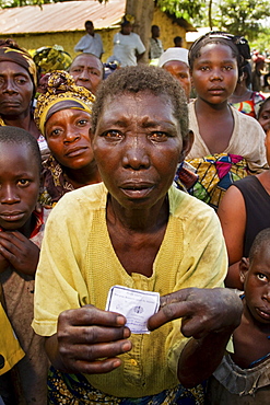 Congolese Villagers wait for food aid