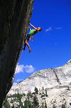 Tim O'Neil climbing Lazer Blade 5.12 in Yosemite National Park, California.