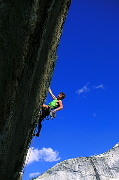 Tim O'Neil climbing Lazer Blade 5.12 in Yosemite National Park, California.