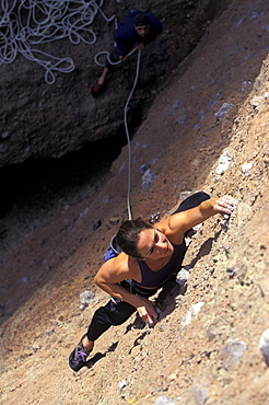 Sabina Allemann climbing Subterranean Tango 5.11 in the Pinnacles in California.