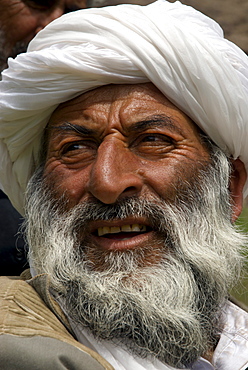 Haji Joma Khan, the head of Char Manar village in Gulran District, talks to wildlife biologists in the northwest part of Herat Province.