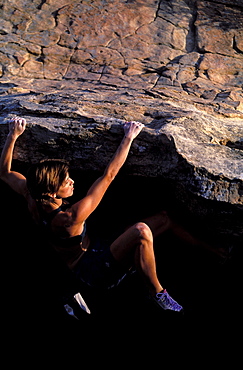 Rikke Ishoy bouldering on an overhang in Santa Barbara, California.