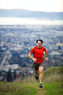 Jeff Rogers trail running in the East Bay Hills above Berkeley and Oakland, California.