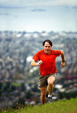 Jeff Rogers trail running in the East Bay Hills above Berkeley and Oakland, California.