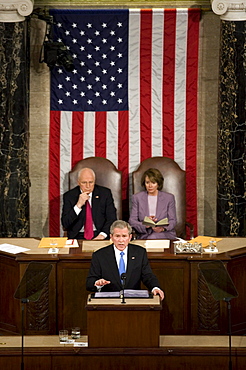 With Vice President Dick Cheney, seated left, and Speaker of the House Nancy Pelosi, D-Calil, seated right, presiding over the speech, President of the United States George W. Bush gives his final State of the Union address to Congress at the Capitol Building on January 28, 2008 in Washington, D.C.