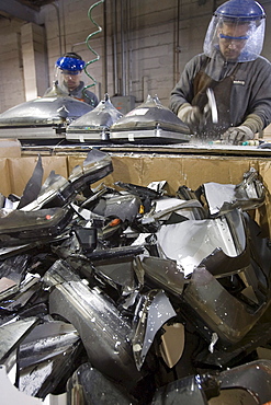 At ElectroniCycle, a recycling company in Gardner, Massachusetts CRT monitors are being broken to be recycled for glass-to-glass recycling.