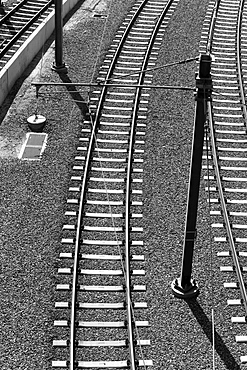 High angle view of empty parallel electric railroad tracks, California