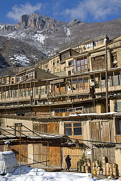 Masuleh, Iran - February, 2008: Quaint mountain village of Masuleh in North Western Iran with its charming earth colored houses stack on each other clinging to the steep mountain side.