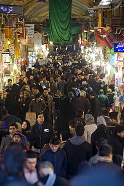 Tehran, Iran - February, 2008: Crowds of shoppers inside the busy Tehran Bazaar in the south of the city.