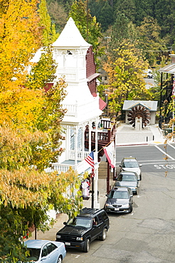 Historic Nevada City firehouse built in 1861 framed by fall leaves, Nevada City, California, USA