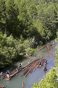 A ganchero was a person dedicated to a craft of assisting in the transport of a large quantity of loose logs floating downstream. by the river Tagus.