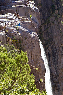 A man prepares to take his 1st basejump of the day at the top of Basaseachic waterfalls in Chihuahua, Mexico