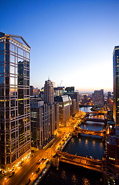 City lights glow at dusk on a clear evening, United States of America