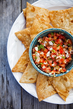 A plate of tortillas and salsa from above, Mexico