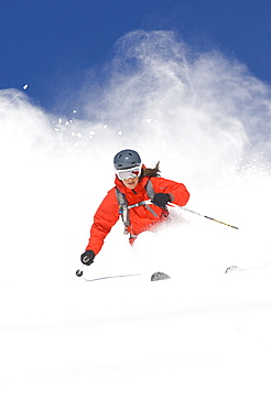 Charlotte Moats skiing fresh powder at Snowbird, Utah, United States of America