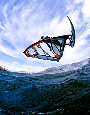 Windsurfer extends a shove it during a summer session at the Wall, United States of America