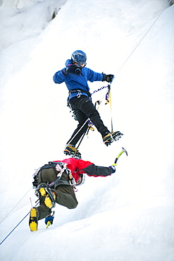 Corey Rich photographs Zach Fletcher while ice climbing in Lee Vining, CA, United States of America