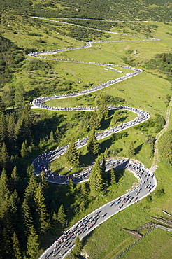 Aerial view of the road up to Passo Pordoi (2239 m), the second pass of the Maratona dles Dolomites bikerace. The race is held o