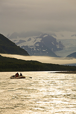 Raft floating down a river in Alaska, United States.