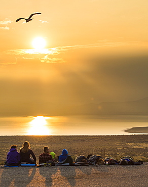 Dirtbag climbers waking up to a sunrise view over Mono Lake