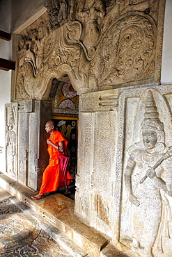 A monk at the temple of the tooth, Kandy, Sri Lanka. (Sri Dalada Maligawa