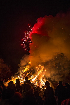 People Amidst Bonfire Against At Night, Dardago, Friuli, Italy