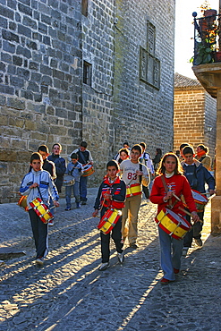 Kids With Drums Walking In The Old Town Of Baeza, Andalucía, Spain, Europe