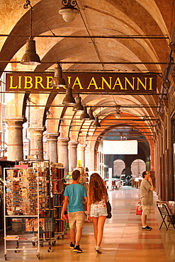 Couple Walking Through A Local Market In Lessona, Piedmont, Italy