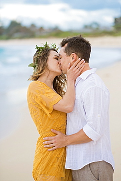 Engaged couple portrait on the beach at North Shore Oahu Hawaii in the Spring.