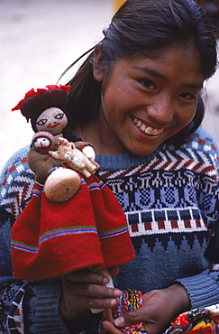 On the Peruvian side of Lake Titicaca located at an elevation of 13,000 feet on the altiplano, families of fishermen live on handmade islands of reeds to avoid government property taxes. With handmade reed