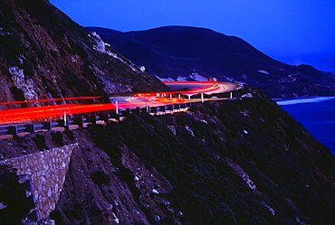 Streaking Car Lights On Mountain Road, California, Usa