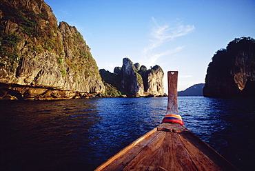 Rock Formations By Sea And Boat Bow