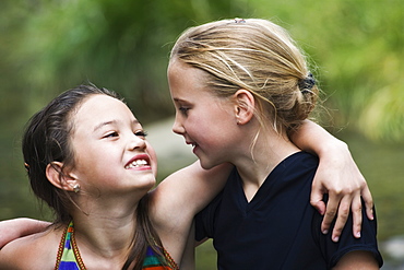 Portrait Of Two Girls Hugging