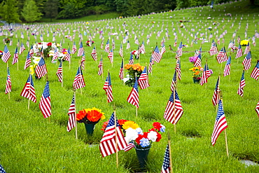 Memorial Flowers And Flags In A Graveyard In Oregon, Usa