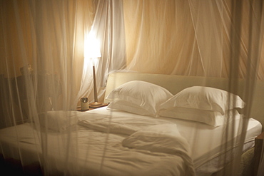 Bedding With Mosquito Netting, Kenya, Africa