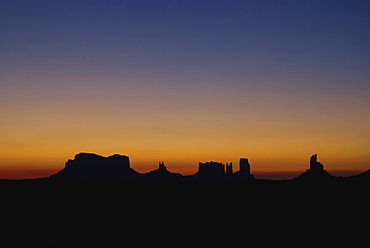 Silhouette Of Rock Formations At Sunset