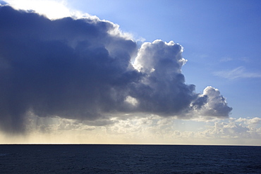 Oregon, United States Of America, Sunlight Behind Dark Clouds Over The Water