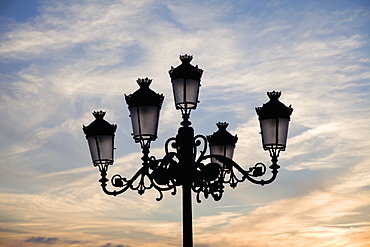 Medina Sidonia, Andalusia, Spain, A Light Post With 5 Lamps On It