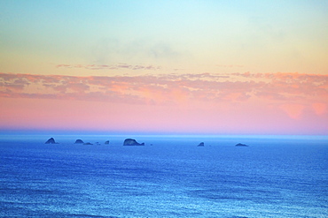 Sunrise Over Rock Formations At Cape Blanco, Oregon United States Of America