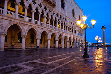 A Street Light Illuminated At Night In Front Of A Building, Venice, Venezia, Italy