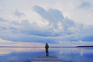 Woman On Public Dock Clear Lake, Canada, Manitoba, Riding Mountain National Park