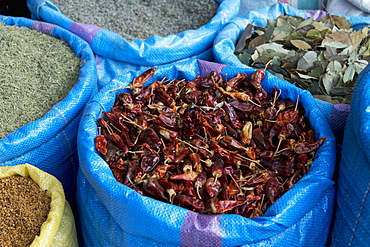 Dried spices in blue bags