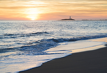 View of the coastline in the distance at sunset, Canos de meca costa de la luz cadiz andalusia spain